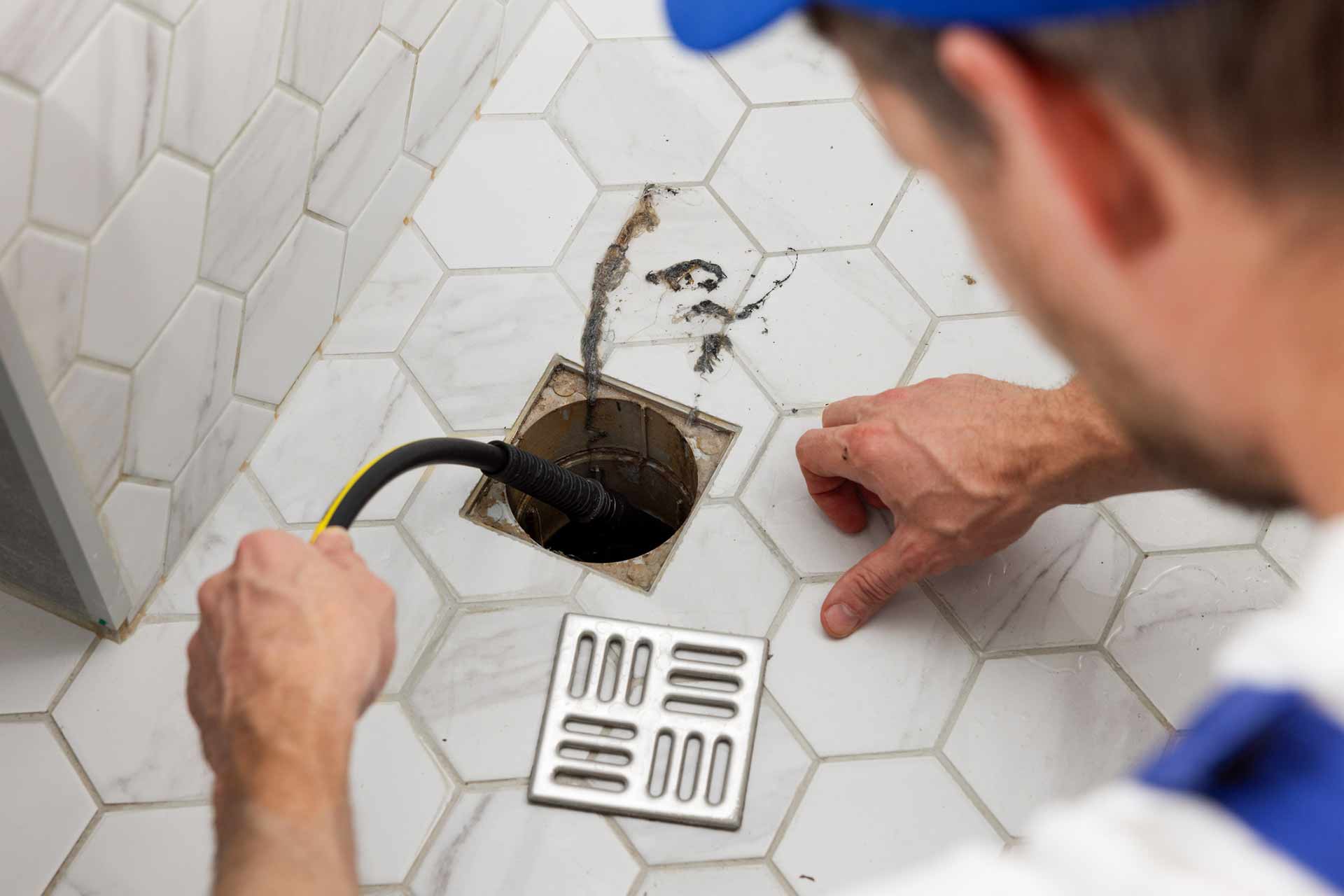 débouchage de drain de douche